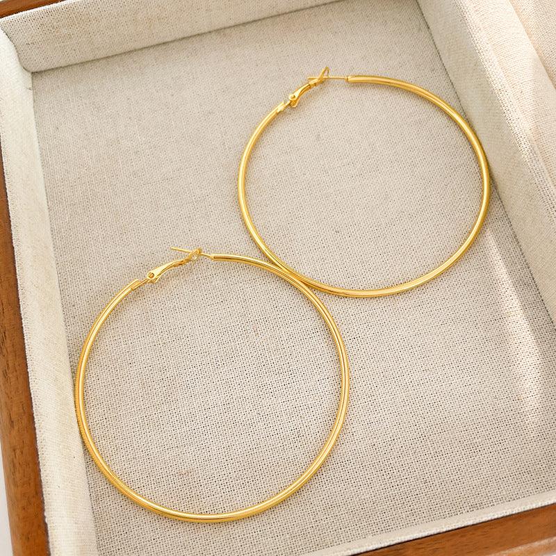 Round hoop earrings 810056657479 - COCOMELODY