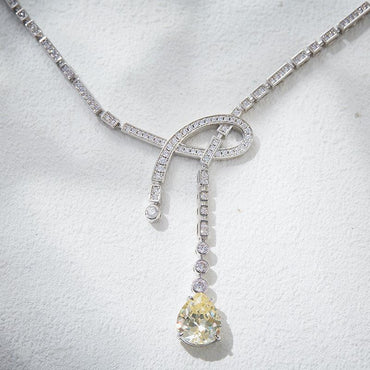 Water drop yellow treasure gold-plated ribbon knot necklace 795816733199 - COCOMELODY