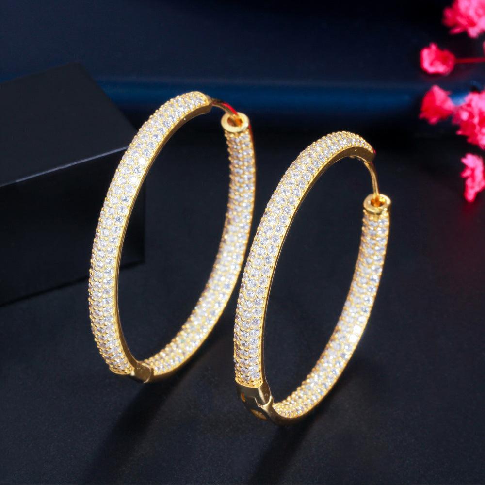 Zircon plated round earrings 641798255069 - COCOMELODY