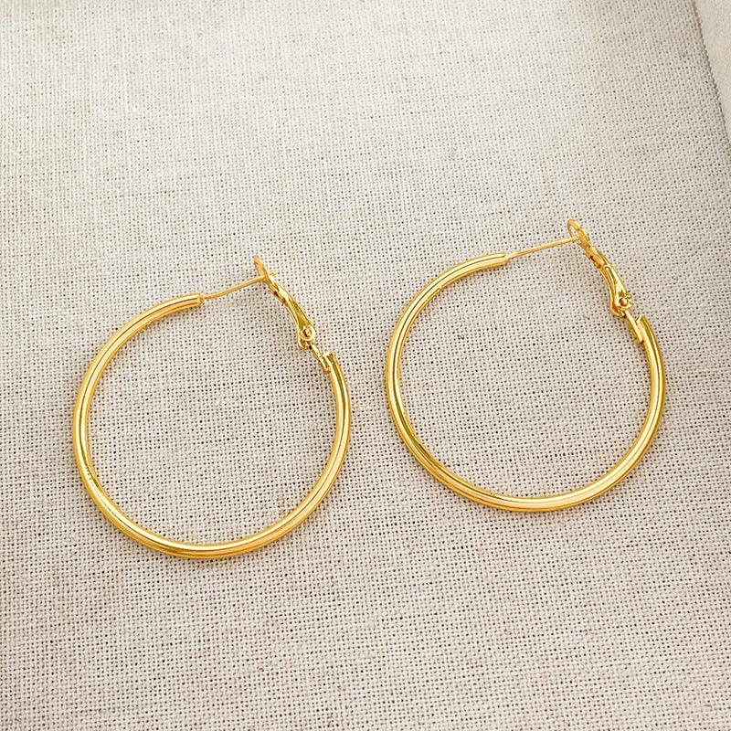 Round hoop earrings 810056657479 - COCOMELODY