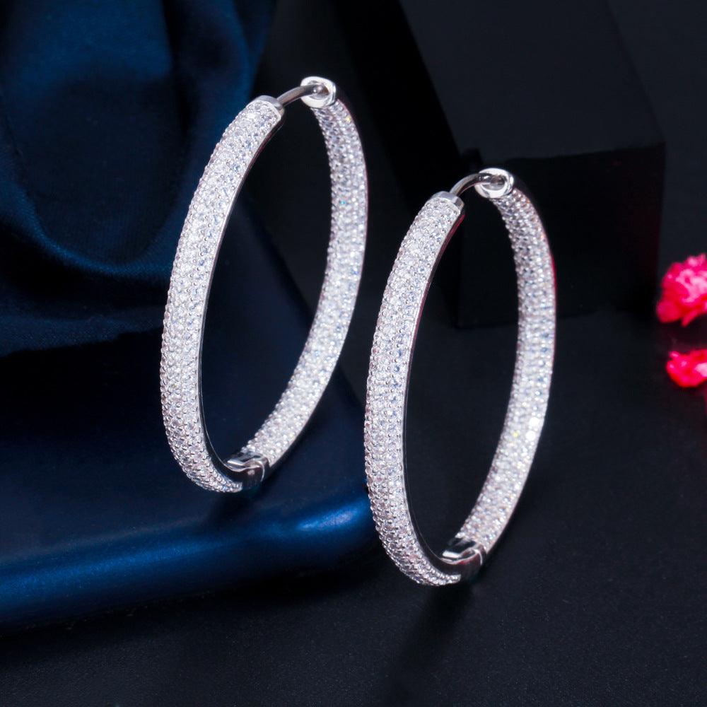 Zircon plated round earrings 641798255069 - COCOMELODY