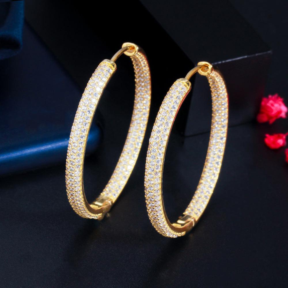 Zircon plated round earrings 641798255069 - COCOMELODY