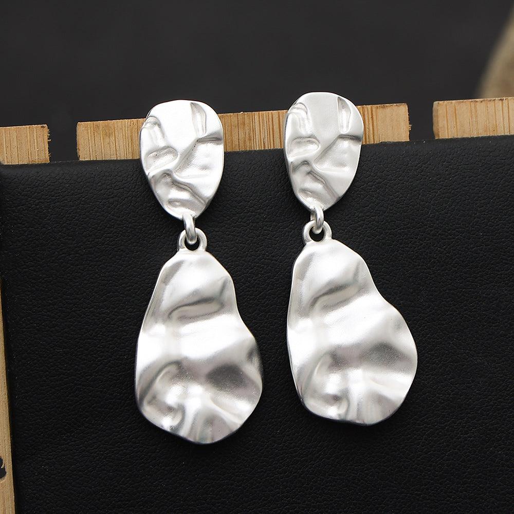 Drop-shaped percussion top fashion earrings 675009716085 - COCOMELODY
